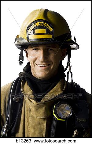 Portrait of a firefighter smiling View Large Photo Image Stock Image - Portrait of a firefighter smiling. Fotosearch