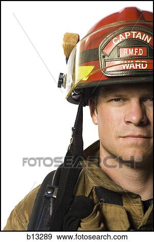 Stock Photo - Portrait of a firefighter. Fotosearch