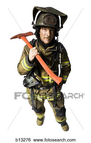 Stock Photograph - Portrait of a firefighter with axe. Fotosearch