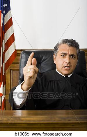 Portrait of a male judge pointing View Large Photo Image Stock Photography - Portrait of a male judge pointing. Fotosearch