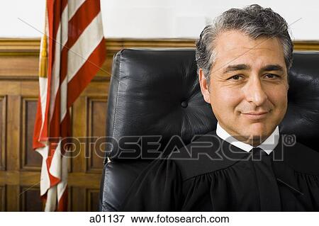 Stock Photo - Portrait of a male judge smiling. Fotosearch