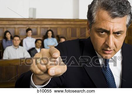 Portrait of a male lawyer pointing View Large Photo Image Stock Photography - Portrait of a male lawyer pointing. Fotosearch