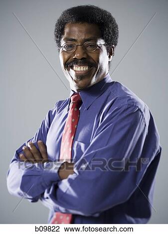 Portrait of a man smiling View Large Photo Image Stock Image - Portrait of a man smiling. Fotosearch