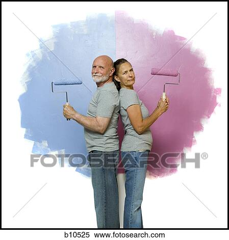 Portrait of a senior couple holding paint rollers View Large Photo Image Stock Photography - Portrait of a senior couple holding paint rollers. Fotosearch
