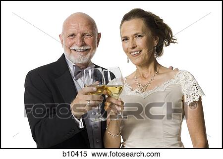 Portrait of a senior couple toasting with wine glasses View Large Photo Image Stock Photography - Portrait of a senior couple toasting with wine glasses. Fotosearch
