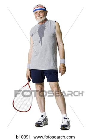 Portrait of a senior man holding a tennis racket View Large Photo Image Stock Image - Portrait of a senior man holding a tennis racket. Fotosearch