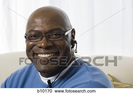 Portrait of a senior man smiling View Large Photo Image Stock Image - Portrait of a senior man smiling. Fotosearch