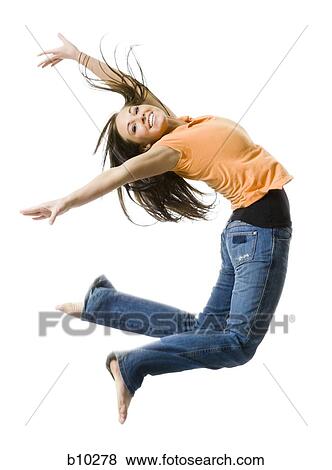 Portrait of a teenage girl jumping View Large Photo Image Stock Photo - Portrait of a teenage girl jumping. Fotosearch
