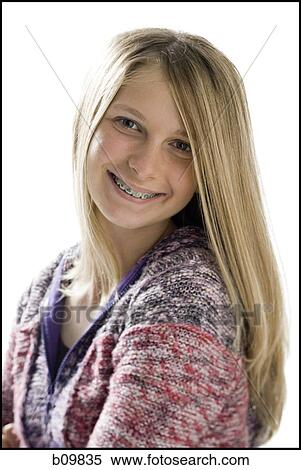 Portrait of a teenage girl smiling View Large Photo Image Stock Photography - Portrait of a teenage girl smiling. Fotosearch