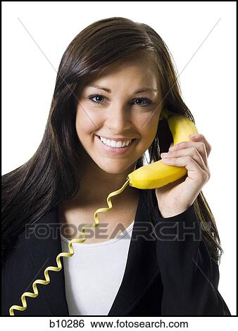 Portrait of a teenage girl talking on the telephone View Large Photo Image Stock Photograph - Portrait of a teenage girl talking on the telephone. Fotosearch