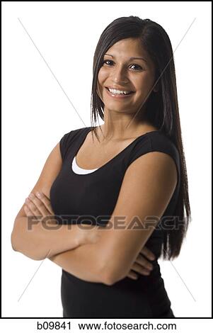 Portrait of a teenage girl with her arms crossed View Large Photo Image Stock Image - Portrait of a teenage girl with her arms crossed. Fotosearch