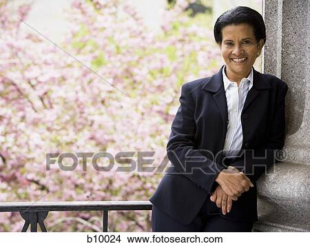 Portrait of a woman smiling View Large Photo Image Picture - Portrait of a woman smiling. Fotosearch