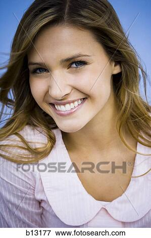 Portrait of a woman smiling View Large Photo Image Stock Photo - Portrait of a woman smiling. Fotosearch