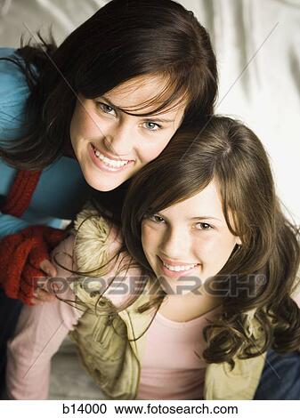 Portrait of a woman with teenage girl View Large Photo Image Stock Image - Portrait of a woman with teenage girl. Fotosearch