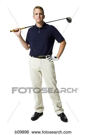 Portrait of a young man holding a golf club View Large Photo Image Stock Photograph - Portrait of a young man holding a golf club. Fotosearch