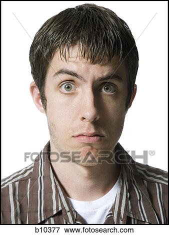 Portrait of a young man looking worried View Large Photo Image Stock Photo - Portrait of a young man looking worried. Fotosearch
