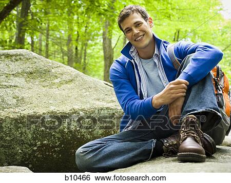 Stock Photograph - Portrait of a young man smiling. Fotosearch