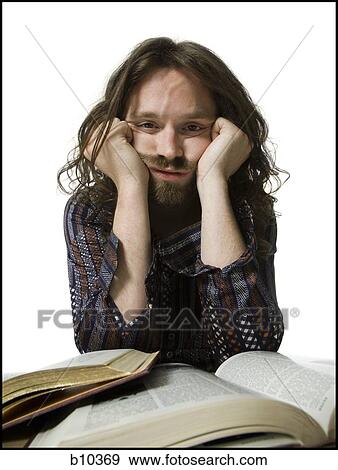 Portrait of a young man thinking View Large Photo Image Stock Photo - Portrait of a young man thinking. Fotosearch