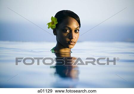 Portrait of a young woman in water View Large Photo Image Stock Photo - Portrait of a young woman in water. Fotosearch