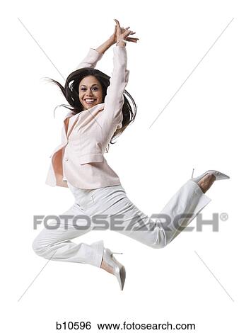 Portrait of a young woman jumping View Large Photo Image Stock Photograph - Portrait of a young woman jumping. Fotosearch