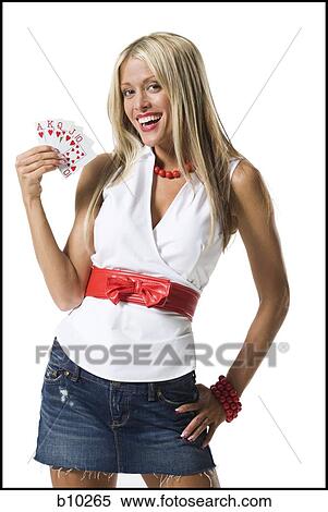 Portrait of a young woman showing playing cards and smiling View Large Photo Image Stock Photography - Portrait of a young woman showing playing cards and smiling. Fotosearch