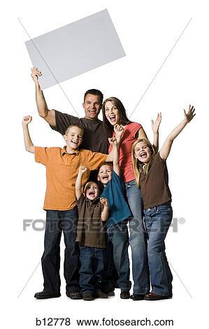 Portrait of family folding a blank sign View Large Photo Image Stock Photo - Portrait of family folding a blank sign. Fotosearch