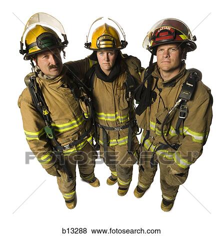 Stock Photo - Portrait of three firefighters. Fotosearch