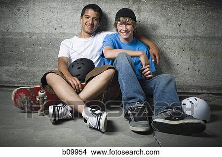 Portrait of two teenage boys smiling View Large Photo Image Picture - Portrait of two teenage boys smiling. Fotosearch