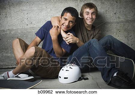 Portrait of two teenage boys smiling View Large Photo Image Stock Image - Portrait of two teenage boys smiling. Fotosearch