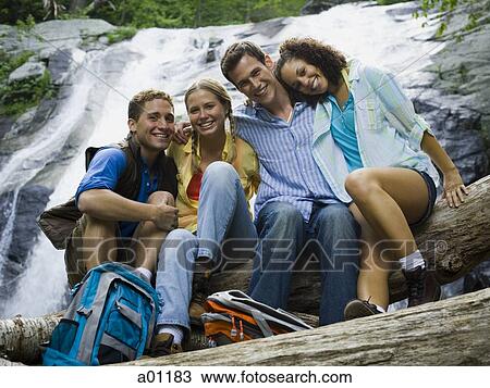 Portrait of two young couples smiling View Large Photo Image Stock Image - Portrait of two young couples smiling. Fotosearch