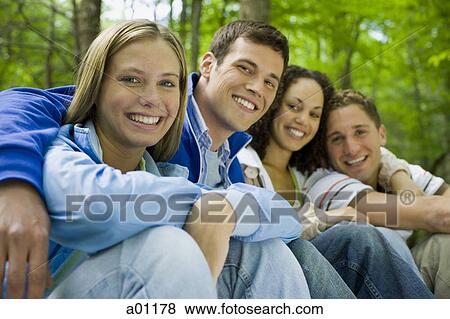 Portrait of two young couples smiling View Large Photo Image Stock Photo - Portrait of two young couples smiling. Fotosearch