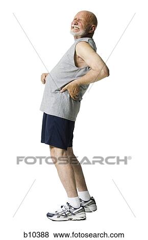 Profile of a senior man suffering from a backache View Large Photo Image Stock Photo - Profile of a senior man suffering from a backache. Fotosearch