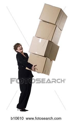 Profile of a senior woman holding a stack of cardboard boxes View Large Photo Image Stock Image - Profile of a senior woman holding a stack of cardboard boxes. Fotosearch