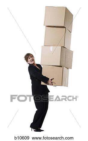 Profile of a senior woman holding a stack of cardboard boxes View Large Photo Image Stock Photo - Profile of a senior woman holding a stack of cardboard boxes. Fotosearch
