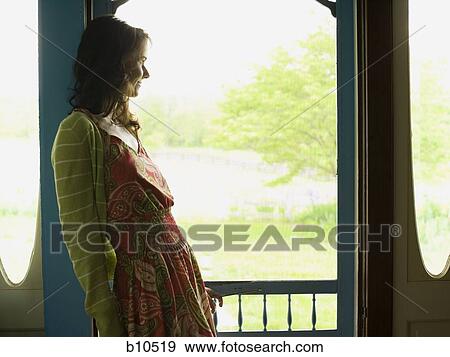 Profile of a woman looking away View Large Photo Image Stock Photo - Profile of a woman looking away. Fotosearch