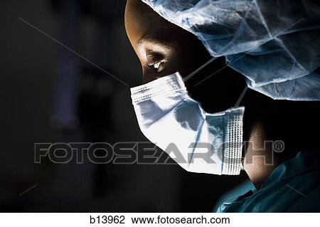 Profile of female surgeon in scrubs View Large Photo Image Stock Image - Profile of female surgeon in scrubs. Fotosearch