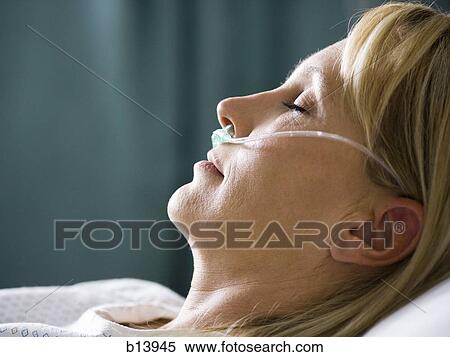 Profile of woman in hospital with respirator View Large Photo Image Stock Photography - Profile of woman in hospital with respirator. Fotosearch