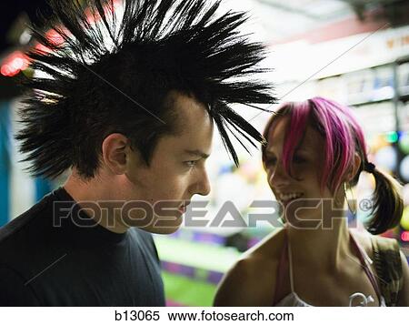 Punk couple at a fairground View Large Photo Image Stock Photography - Punk couple at a fairground. Fotosearch