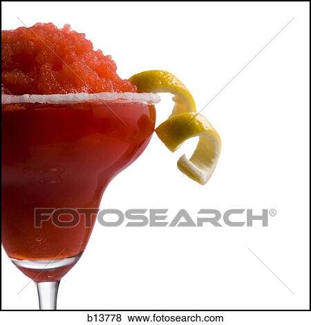 Red slush beverage in cocktail glass with lemon garnish View Large Photo Image Stock Photo - Red slush beverage in cocktail glass with lemon garnish. Fotosearch