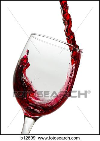 Stock Photo - Red wine pouring into wine glass. Fotosearch