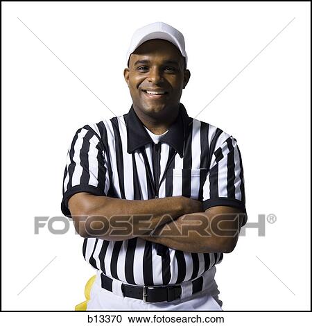 Referee standing with arms crossed View Large Photo Image Stock Image - Referee standing with arms crossed. Fotosearch