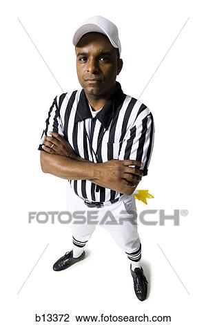 Referee standing with arms crossed View Large Photo Image Stock Image - Referee standing with arms crossed. Fotosearch