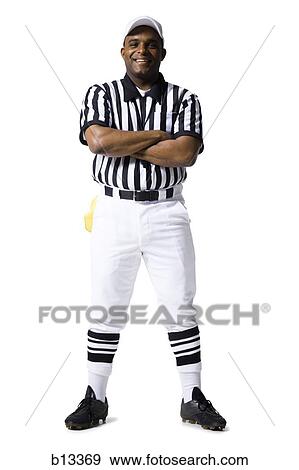 Referee standing with arms crossed View Large Photo Image Stock Photo - Referee standing with arms crossed. Fotosearch