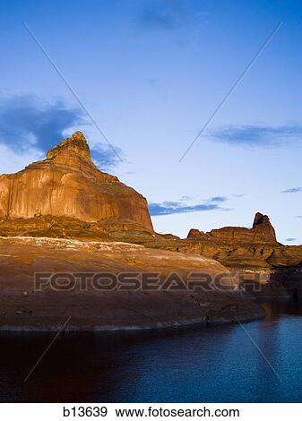 Rock Formation with water and blue sky View Large Photo Image Stock Photo - Rock Formation with water and blue sky. Fotosearch