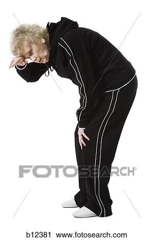 Senior woman taking a break from exercising View Large Photo Image Stock Image - Senior woman taking a break from exercising. Fotosearch