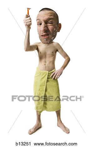 Stock Image - Shirtless man with cuts on face from shaving. Fotosearch