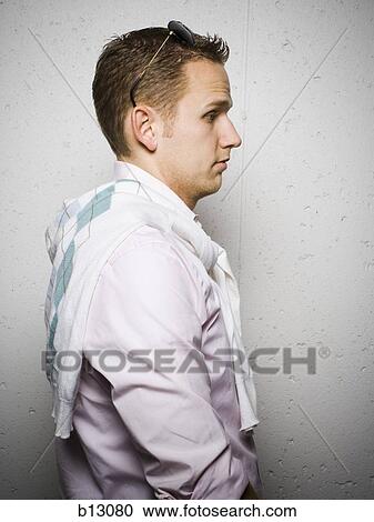 Side profile of man with sunglasses on head View Large Photo Image Stock Image - Side profile of man with sunglasses on head. Fotosearch