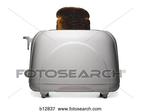 Slice Of Burnt Toast In A Toaster Stock Photo B127 Fotosearch