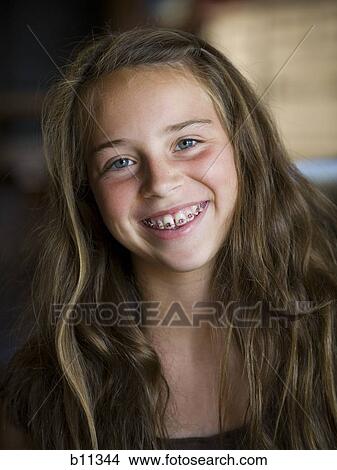 Smiling girl View Large Photo Image Picture - Smiling girl. Fotosearch