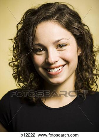 Stock Image - Smiling teenage girl. Fotosearch